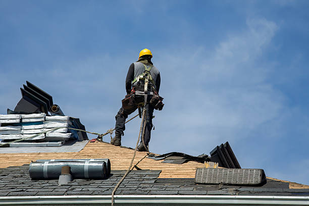 Professional Gutter Installation technician working in Moss Point, MS